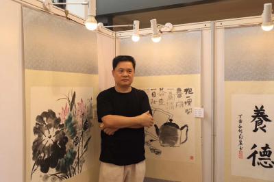 金新宇日记-忠于党忠于人民一一广州市机关书画摄影作品展今天在越秀公园开幕。市委副书记欧阳卫民【图5】