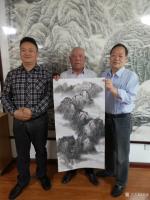 艺术家郑诚生活:与古楼兰丝绸之路文化传媒公司董事长，总经理，秘书长一起挥毫交【图1】