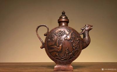 明清古艺收藏-【皇家……酒壶】紫铜
高19宽18厘米，壶呈凤凰形状，一面刻开屏孔雀，一面刻喜【图1】