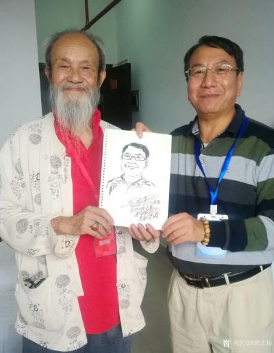 洪志标日记-在福州“一带一路”世界客家文化旅游大会期间与《福建侨报》社长总编陈莺强（中）《财【图3】