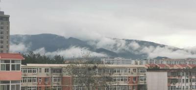 马一祥日记-从我家北窗可以看到莽山一脚，经常情不自禁地拍下雨后的云：“窗外蟒山处，雨停云脚低【图1】