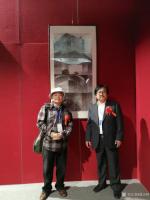 艺术家郭正明荣誉:2018.4.18曰郭正民在敦煌会展中心画展开幕中,图为与著【图4】