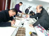 艺术家周居安生活:兰州军创画院新年笔会活动又开始啦,图为画院各位老师去全神贯注【图5】