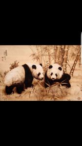 艺术品图片：艺术家王全战手工作品名称《烙画-熊猫》议价